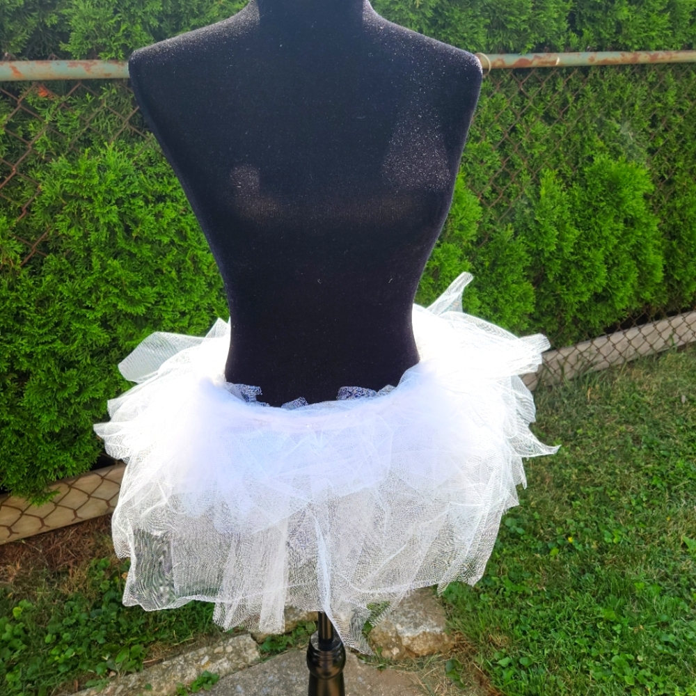 White tulle skirt with beads on waist size 17 to 20in on teens. Size M to Large